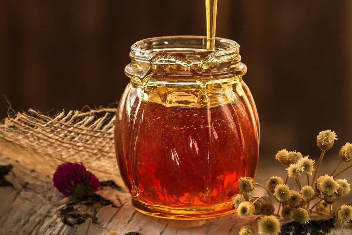 العسل الاصلي في مصر؛ فاتح ذهبي بني رحيق الزهور الأحماض الأمينية البروتينات