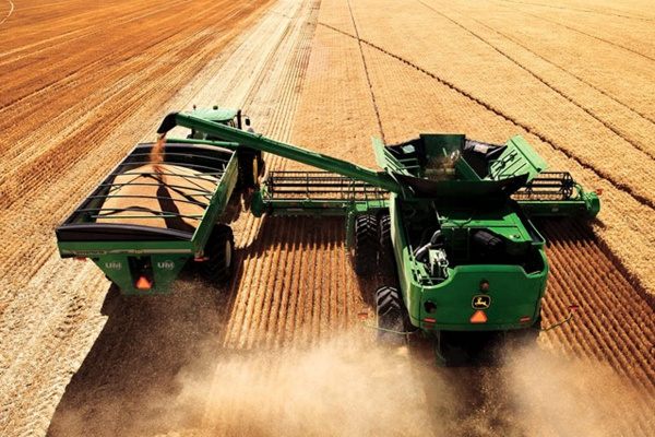 Combine tractor machinery farm equipment trade-off