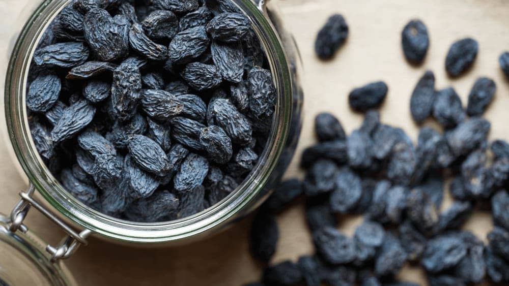 Buy dried black raisins with seeds + Best Price