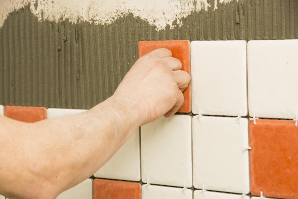 Installing ceramic tile on shower walls