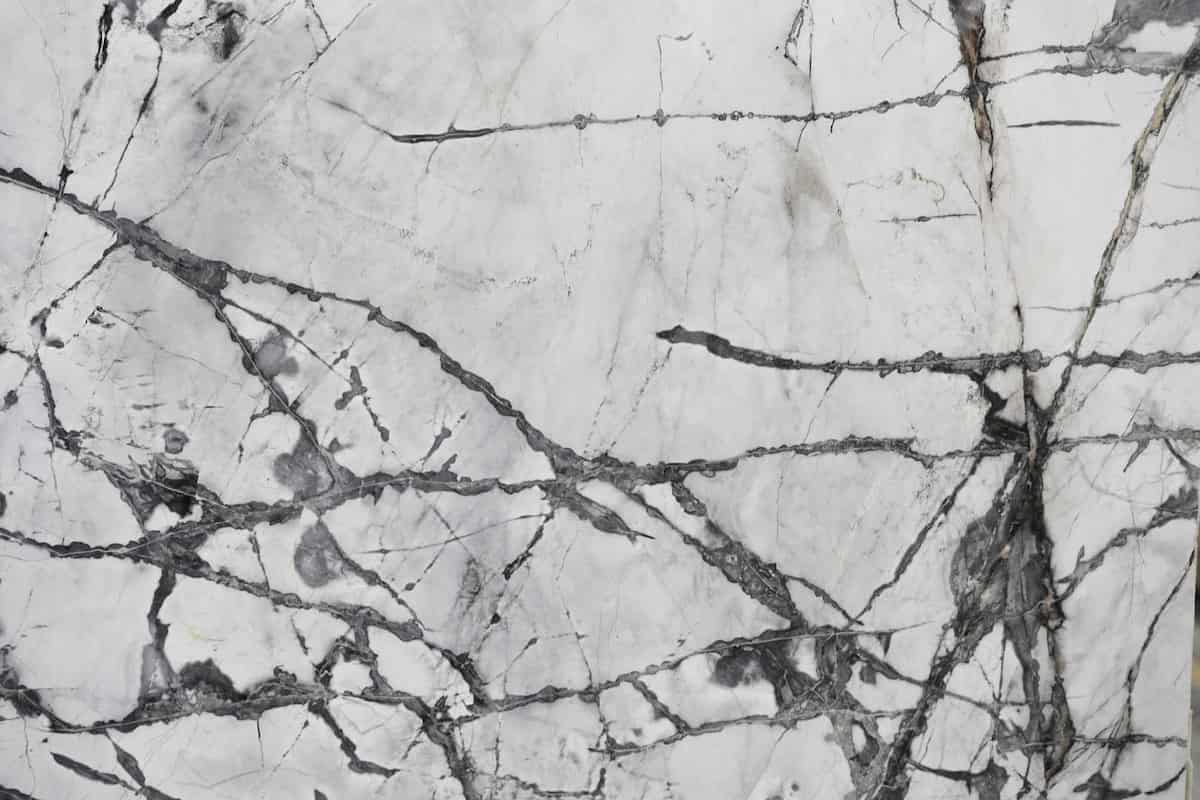white marble tile with black veins in inddor uses