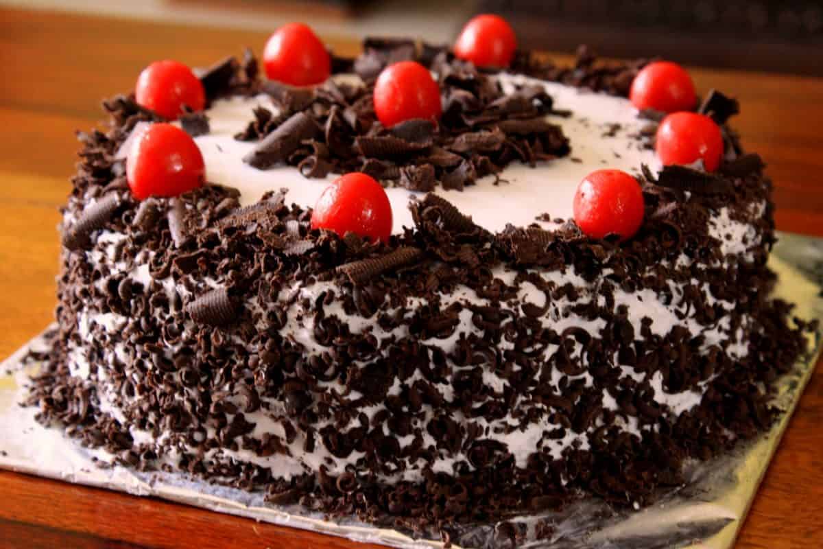 Half Kg Cake Black Forest; Sponge Layers Delicate Texture Chocolate Cream