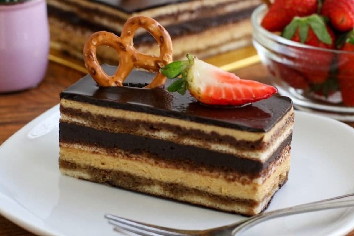 Opera Cake in Qatar; Sponge Moisten Texture Contain Almond Coffee Buttercream Chocolate