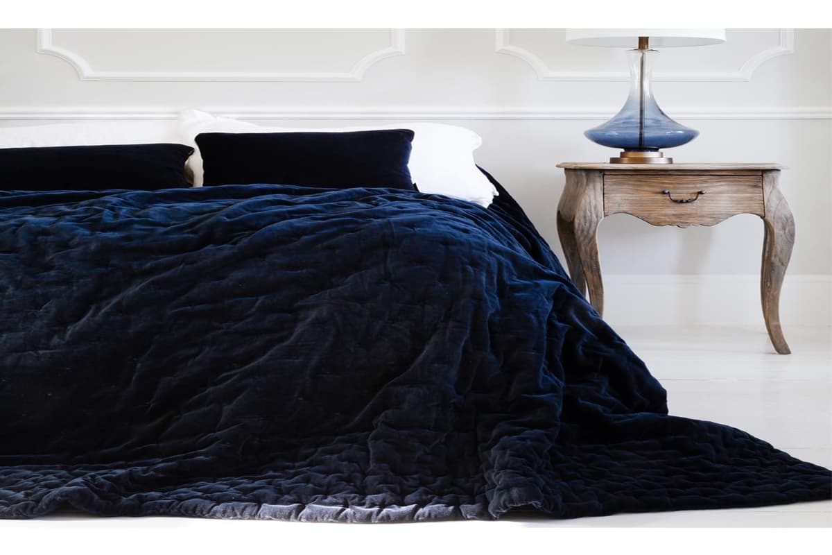 navy blue and white bedspread