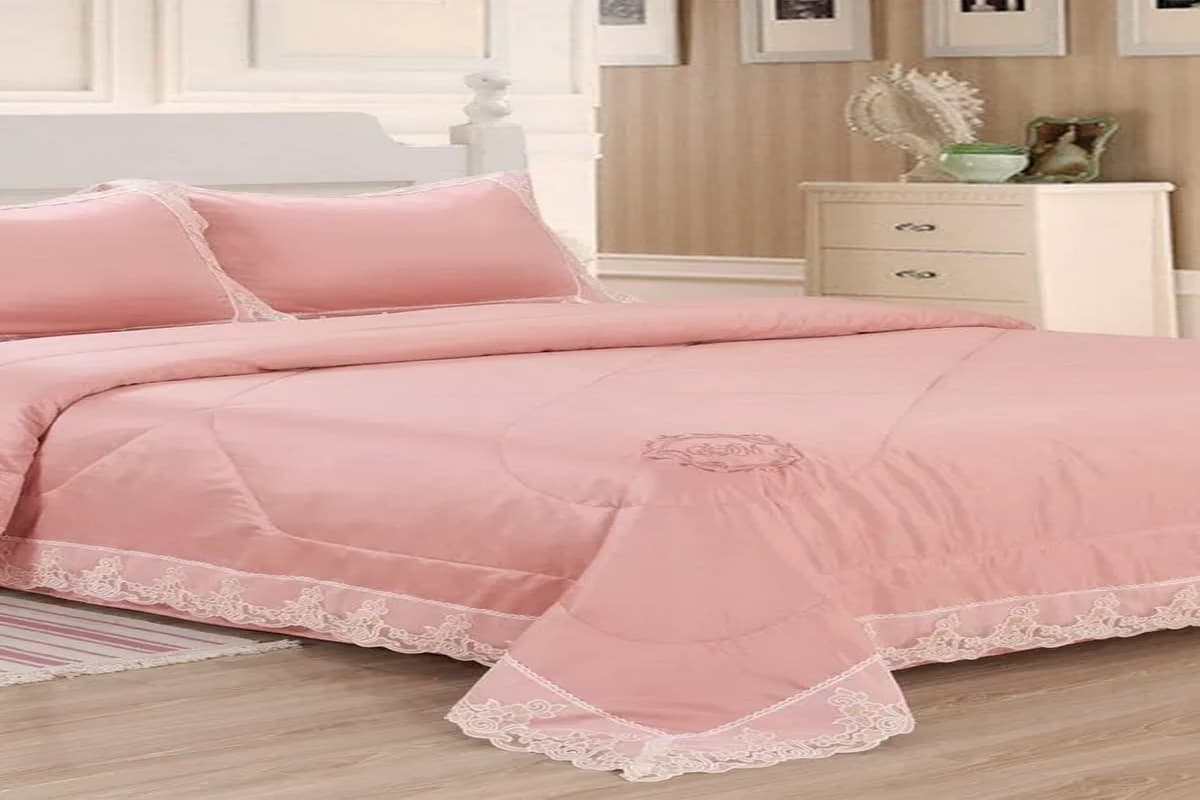 pink quilted bed throw