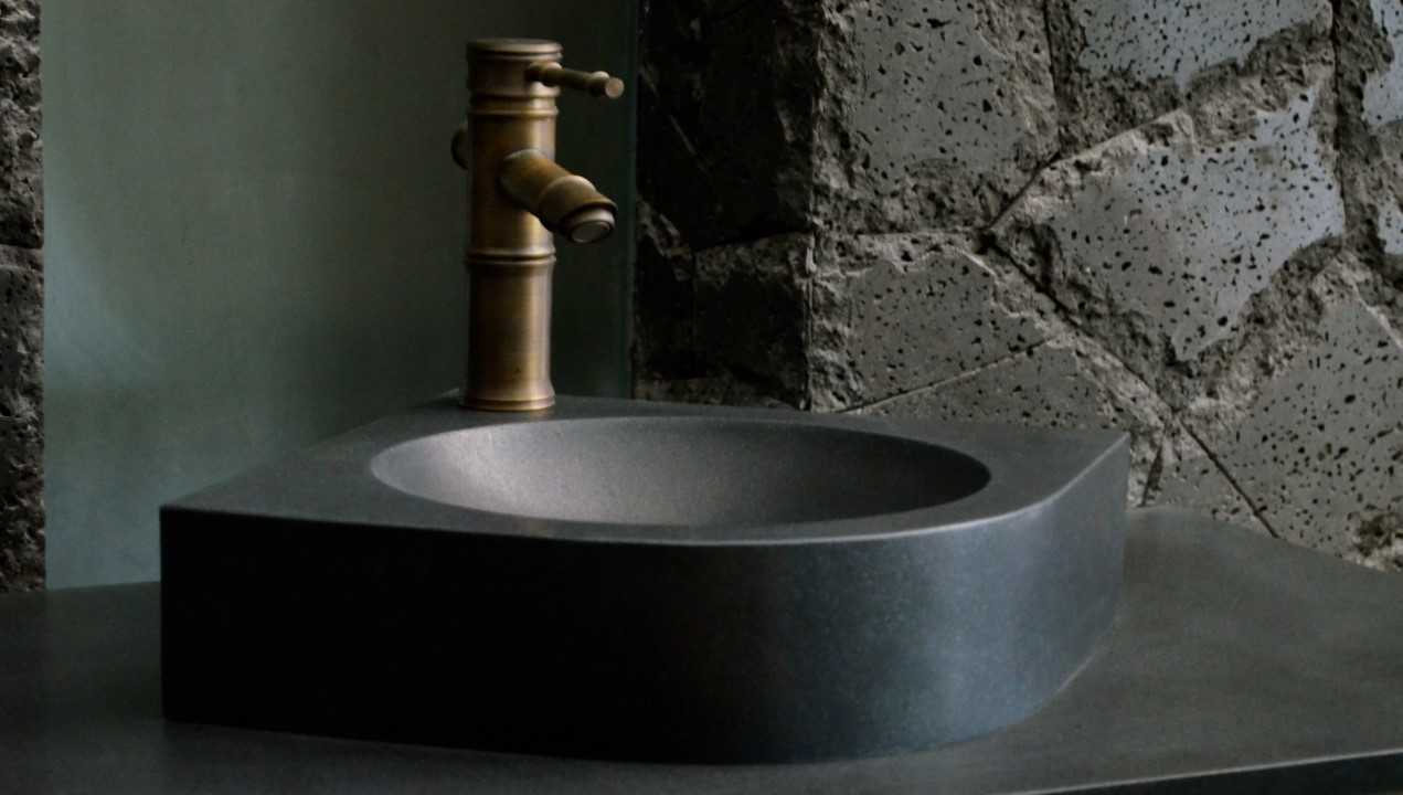 Black wash basin with Yellow cabinet