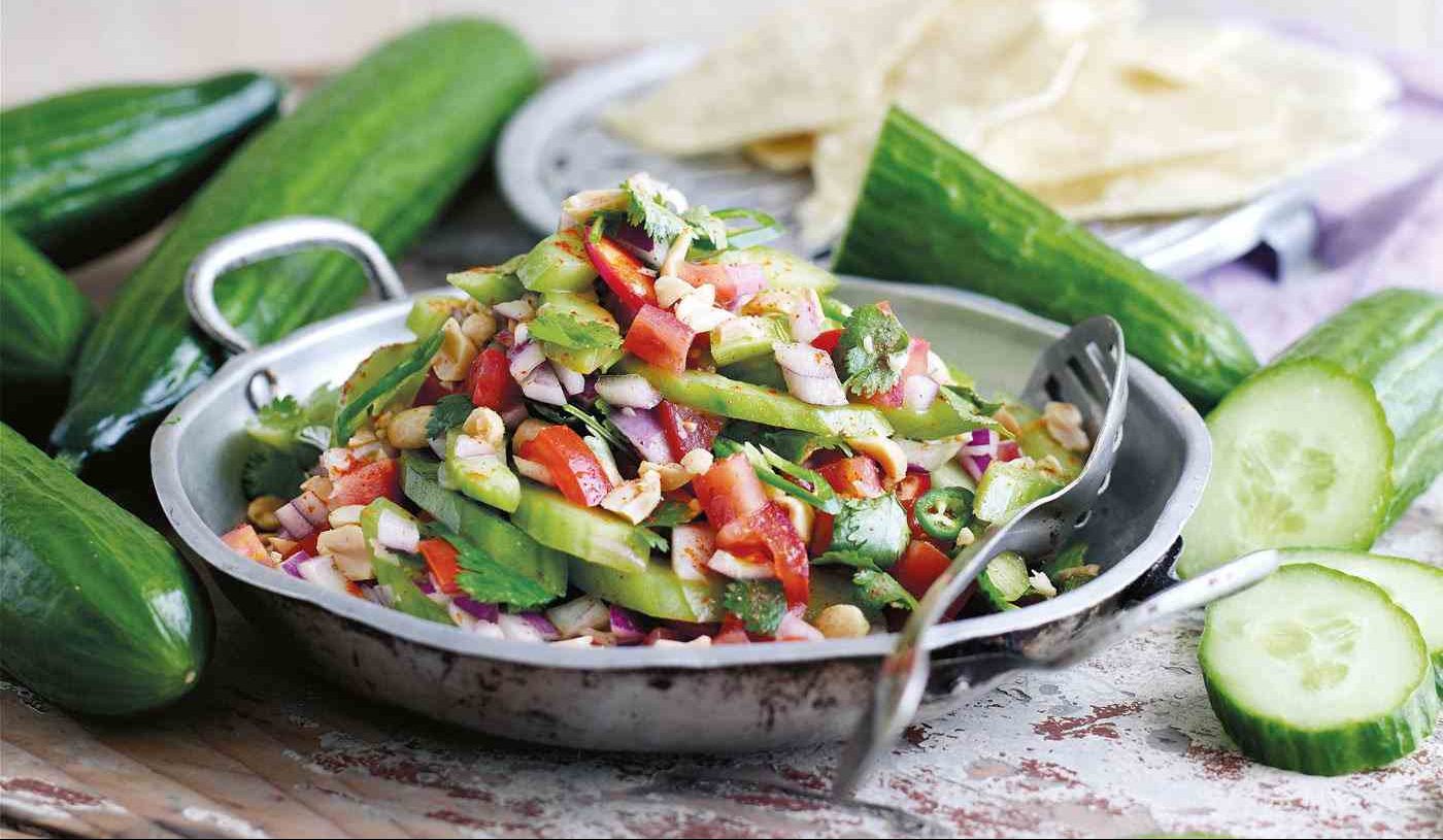 Salad with tomato, cucumber, and feta quinoa