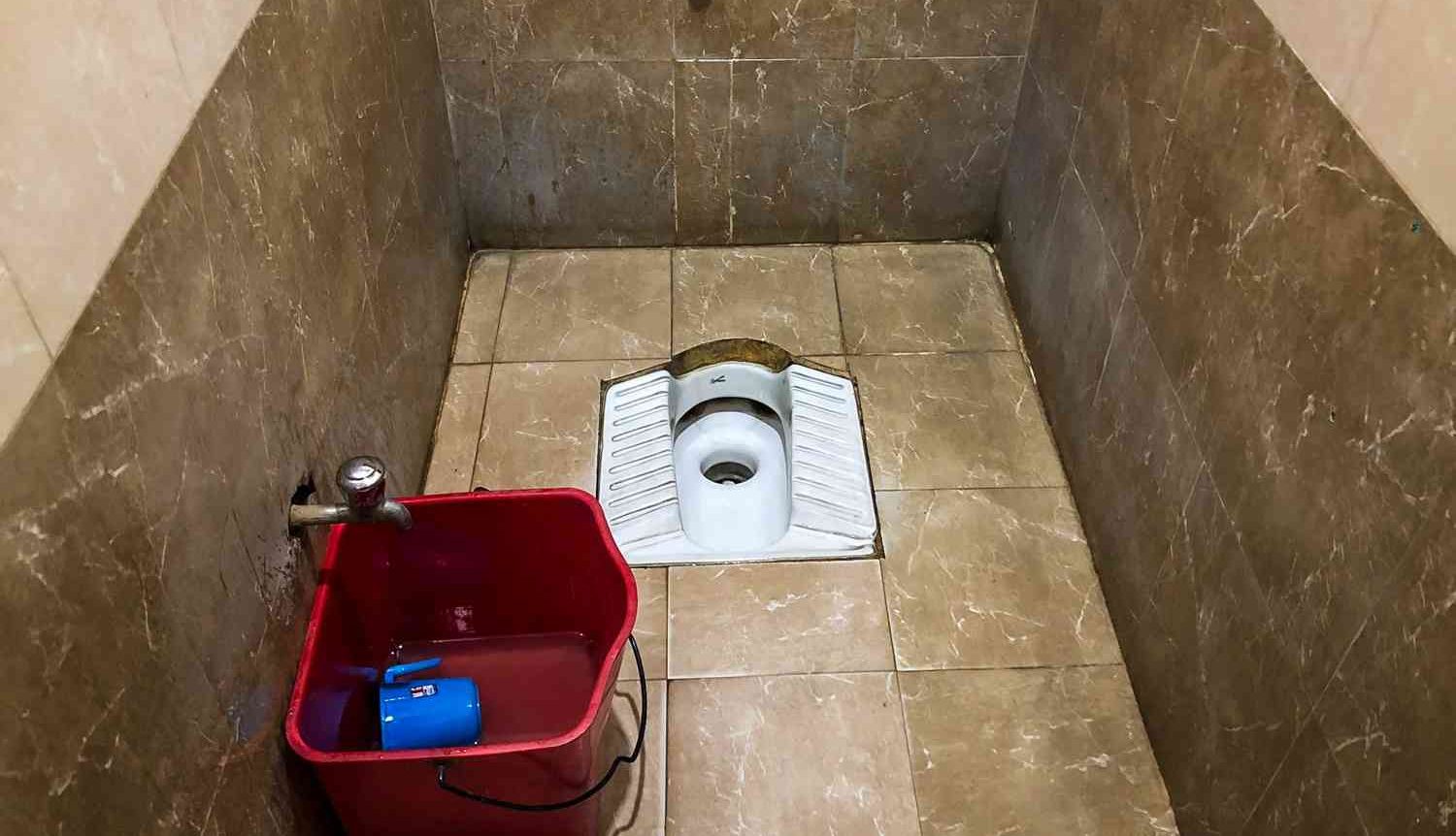 Squat pan toilet making noise
