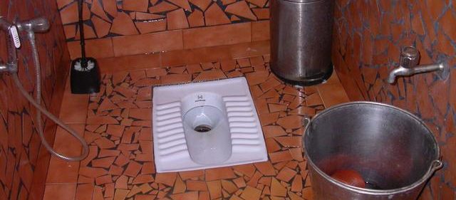Squat pan toilet