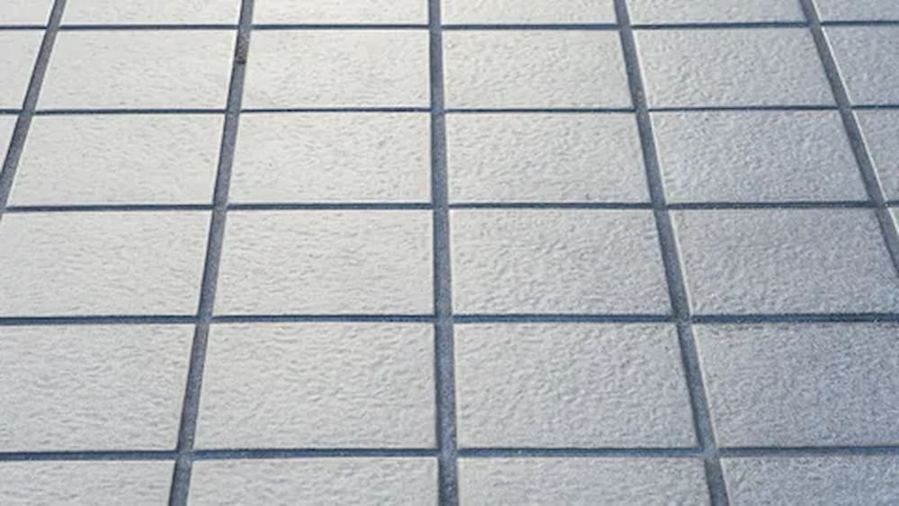 Anti slip coating for bathroom tiles