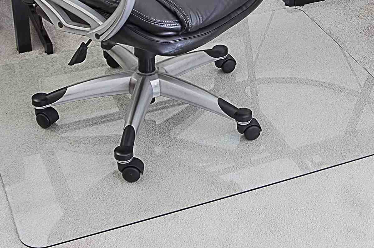 Plastic mat for office chair on wood floor