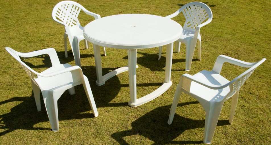 Green plastic tables and chairs