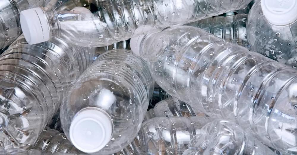 What raw materials are used to make plastic water bottles