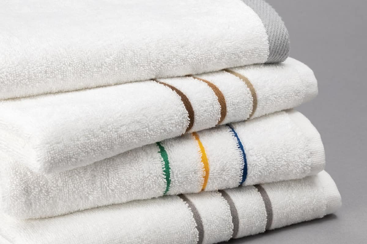 What factors affect the quality of promotional towels?