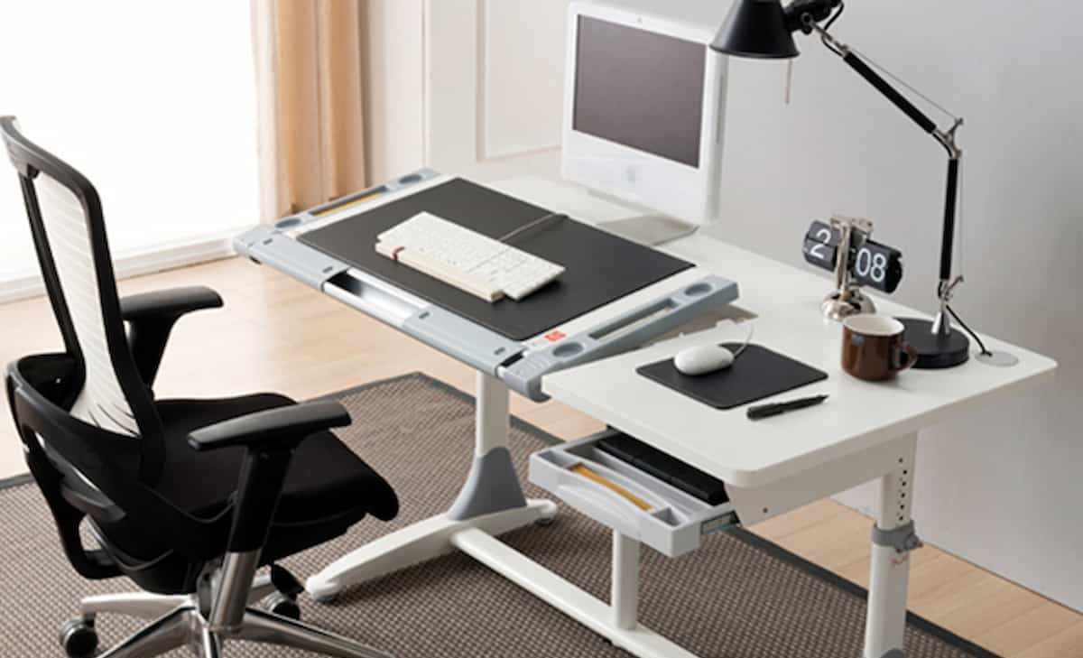 ergonomic desk setup with laptop