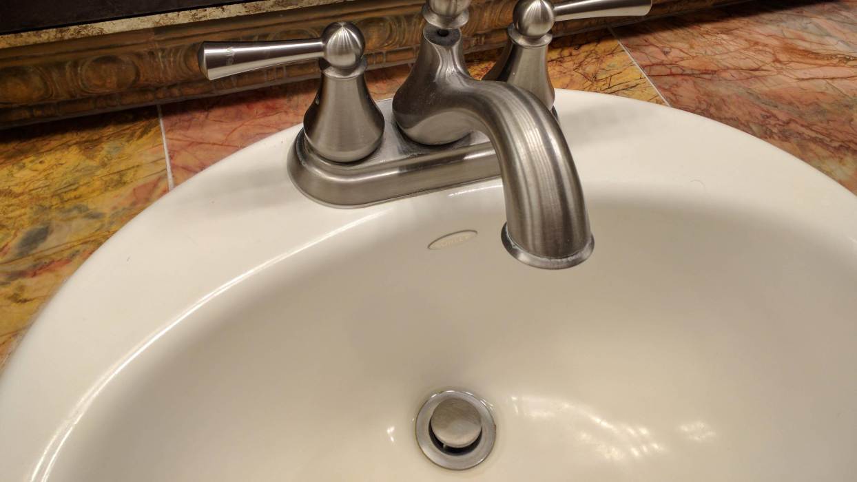 widespread bathroom faucet drain