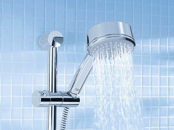 Wall mounted shower mixer taps