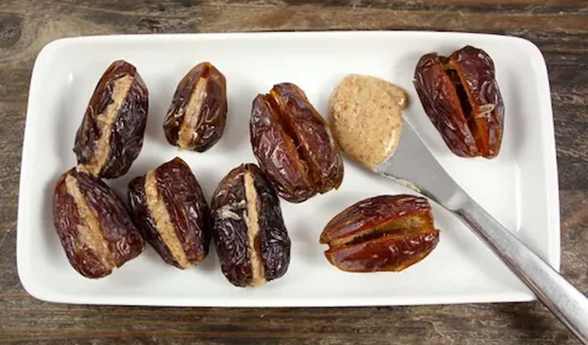 pitted dates with peanut butter