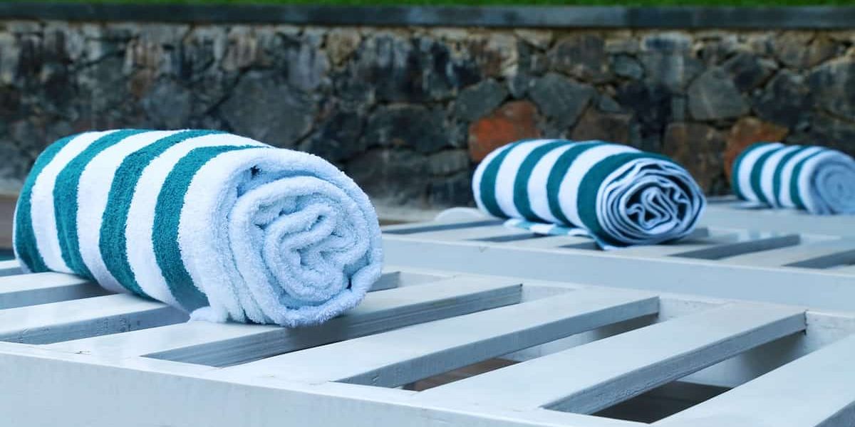 Pool towel rack