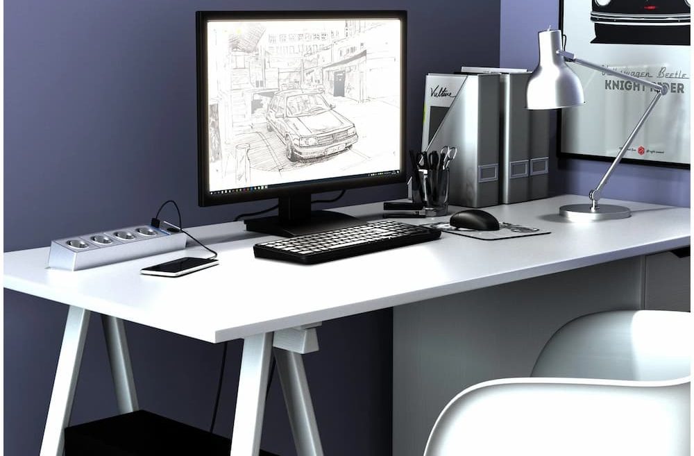 ergonomic desk with laptop and monitor