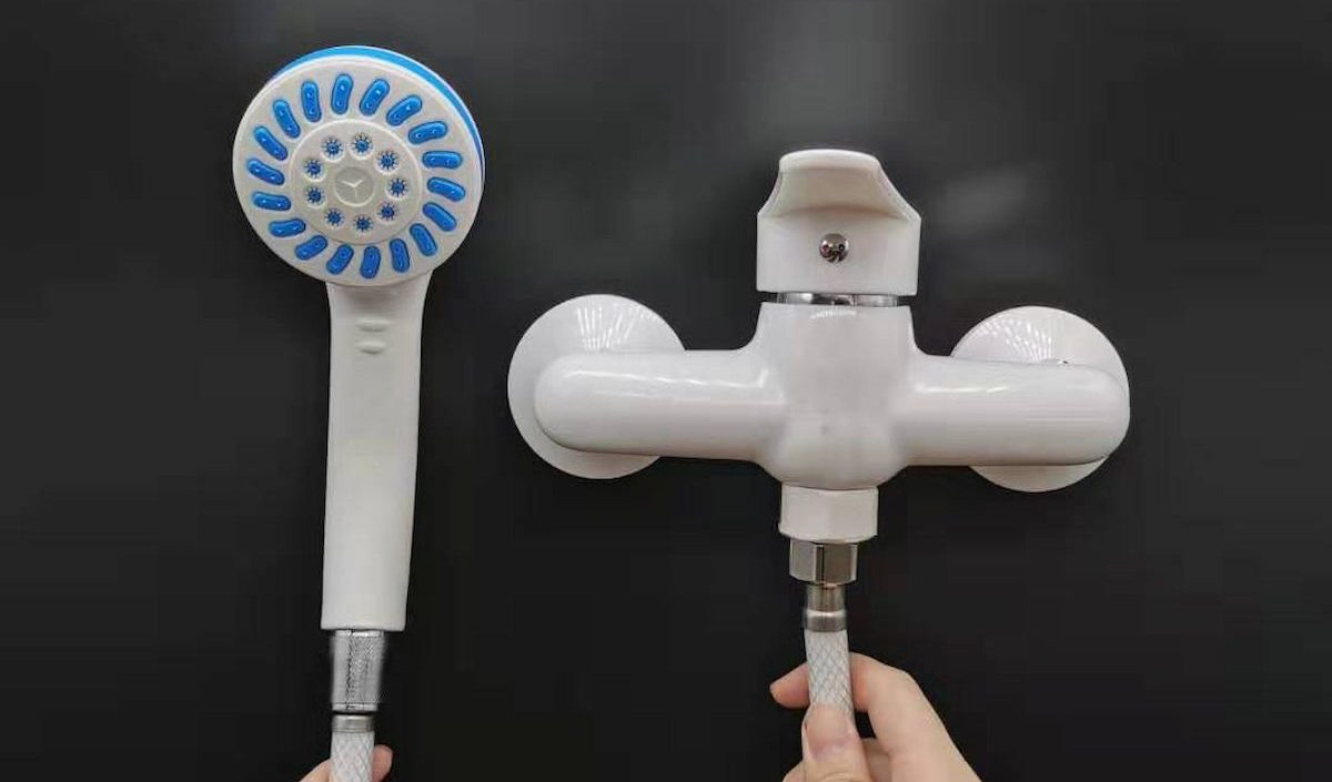 The plastic shower head holder