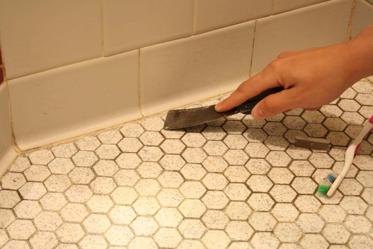 repairing tiles with grout