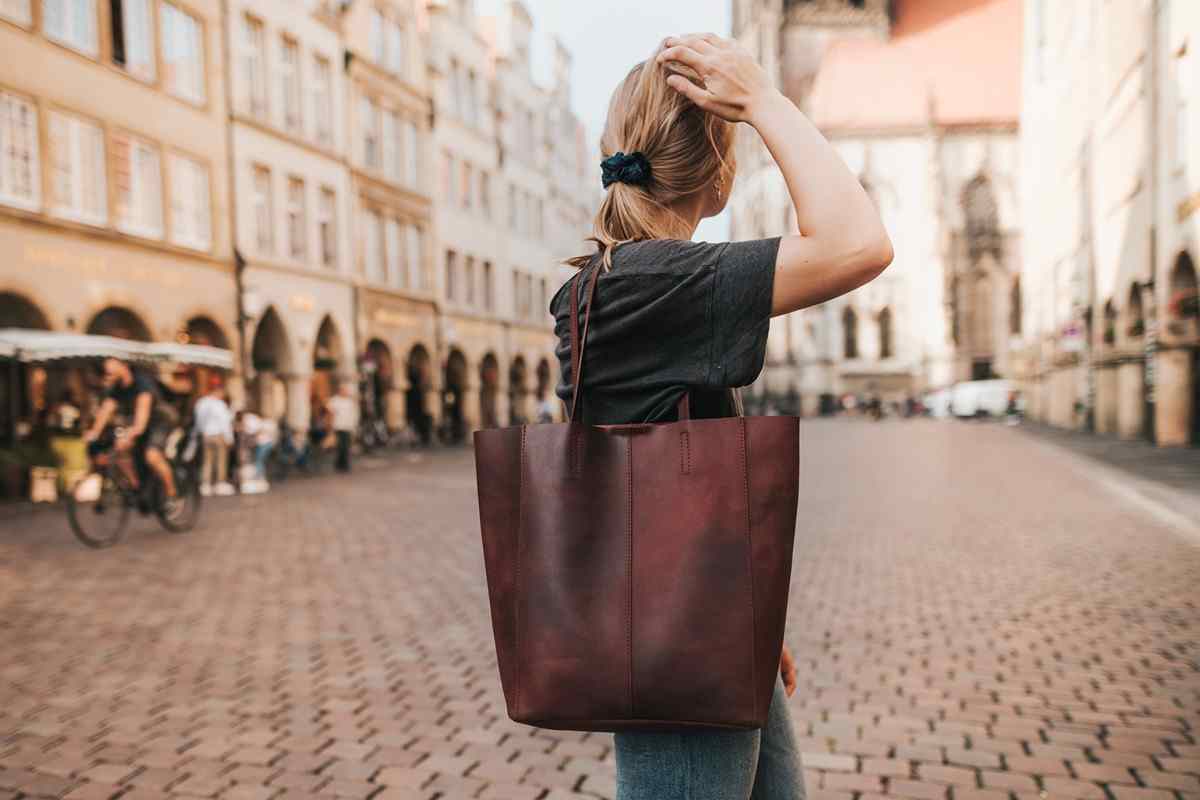leather handbags australia status anxiety