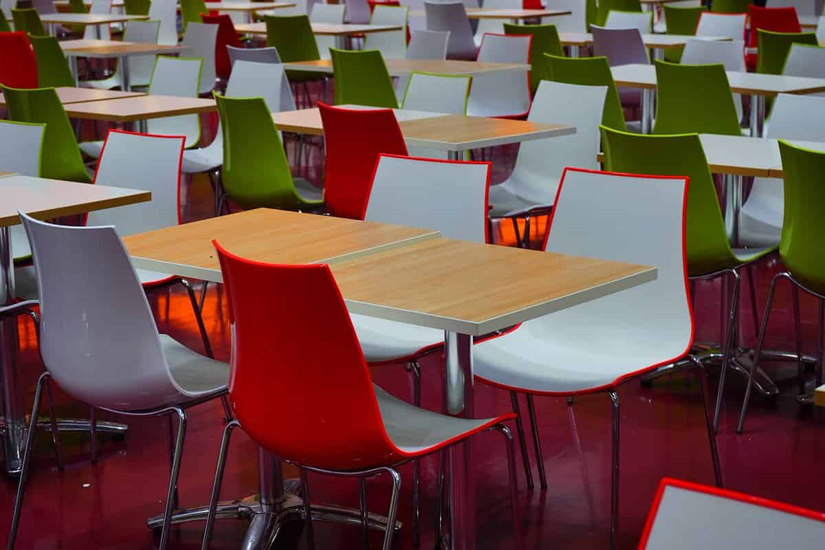 white plastic tables and chairs