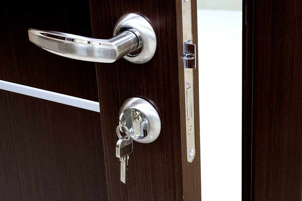 Composite door handle sticking