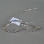 عینک طبی دخترانه شش ضلعی؛ پلاستیک فلز کائوچو (مشکی کرم) گرد