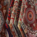 فرش دستباف ابریشم سالاری؛ پشمی رنگ سرمه ای مشکی رج (50 60)