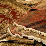 فرش دستباف 12 متری (قالی) قرمز سفید کرمی طرح ترکمن اسلیمی