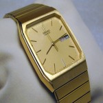 ساعت طلایی رنگ؛ دایره ای جنس بند (فلزی پلاستیکی) مردانه زنانه