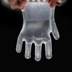 دستکش یکبار مصرف ۱۰۰ عددی؛ جنس پلاستیک نایلون سایز (کوچک بزرگ)