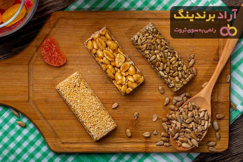 طرز تهیه سوهان عسلی کنجدی + قیمت خرید