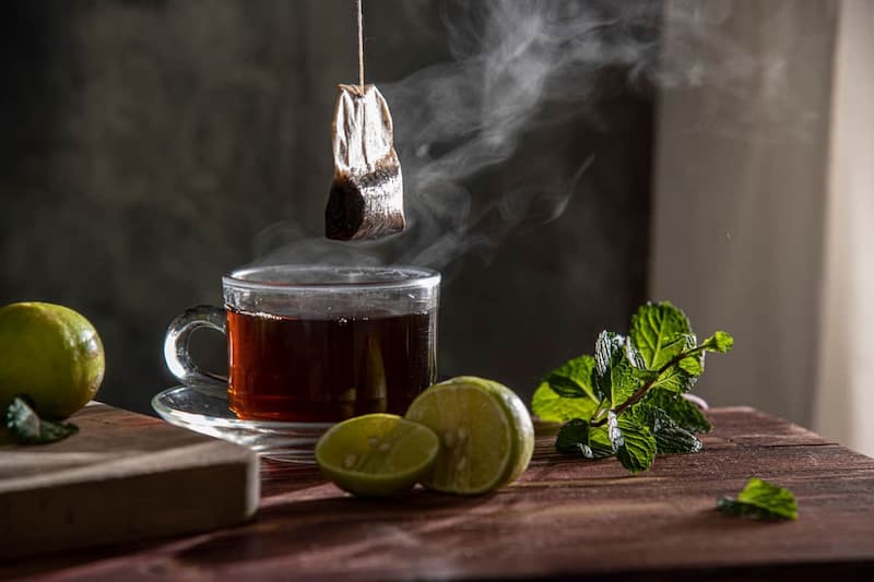 چای کیسه ای عمده؛ طعم زنجبیل به لیمو زعفران دارچین 2 جنس کاغذی نایلون